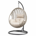Runder Hängesessel mit Stahlrahmen und Polyrattan, Beige